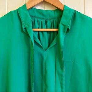 Bright Kelly green flowy top with tie neck NWOT